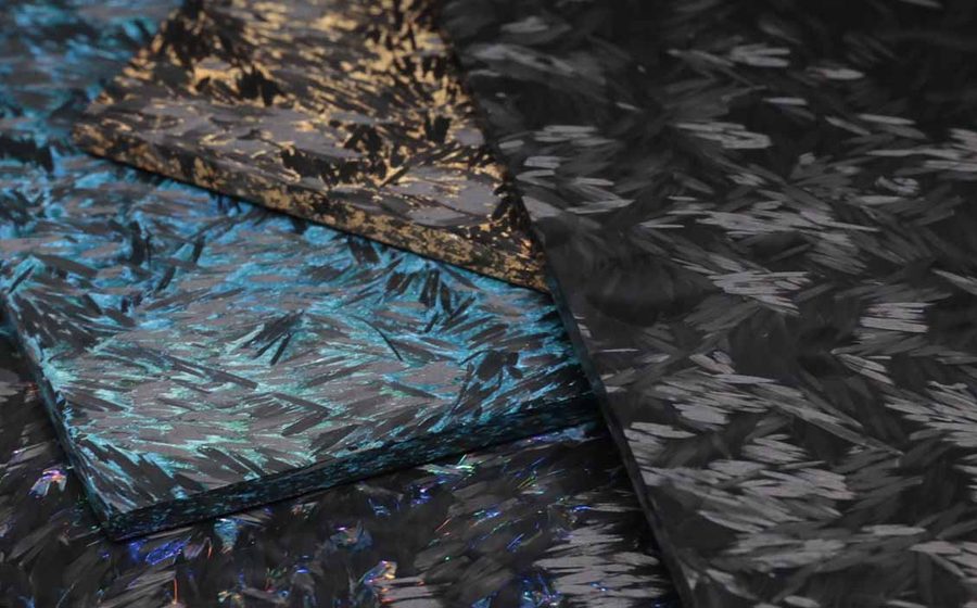 Colored forged carbon fiber panel with a blue and gold random texture